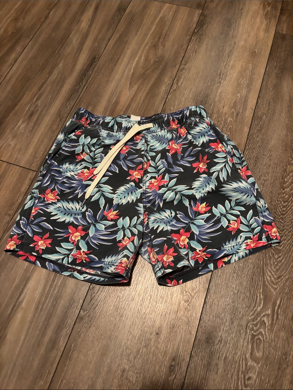 Fair Harbor 6” Black Tropical Floral Swim Trunks with Red Accents